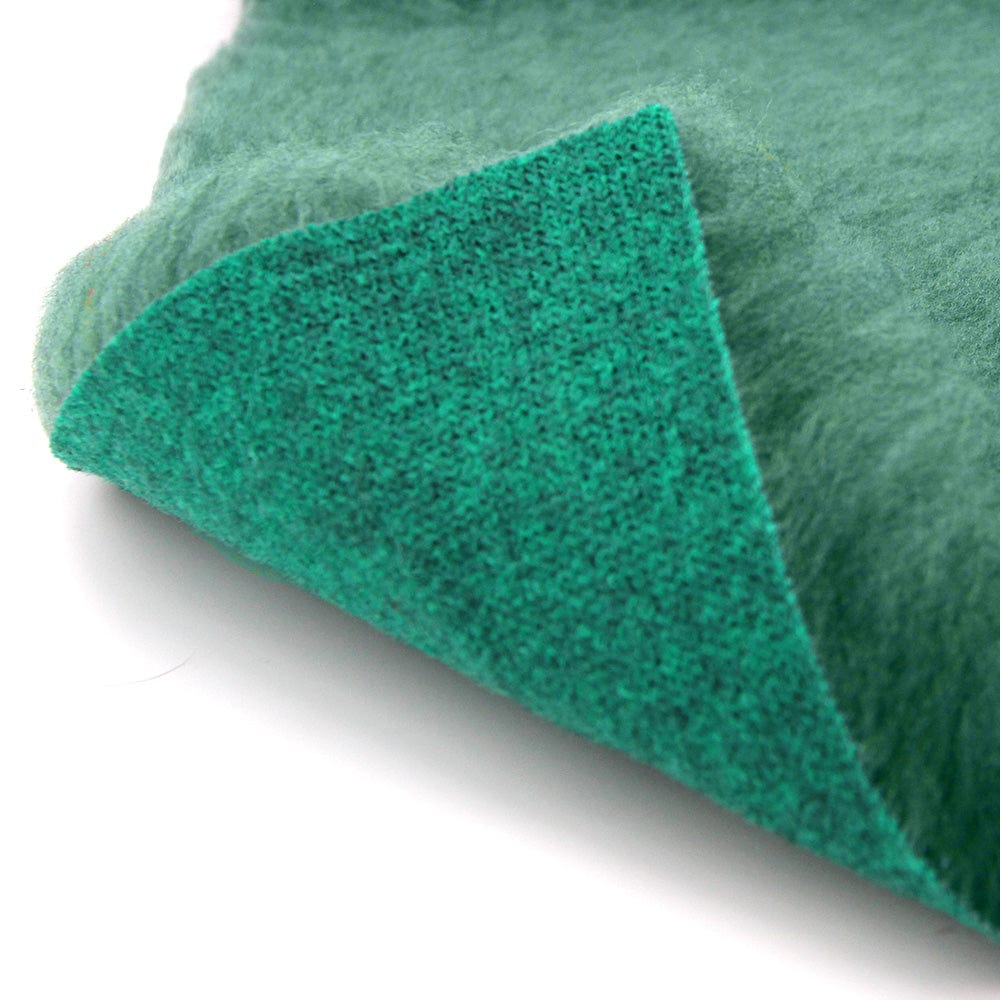 Rolls of green back vet bedding by ProFleece